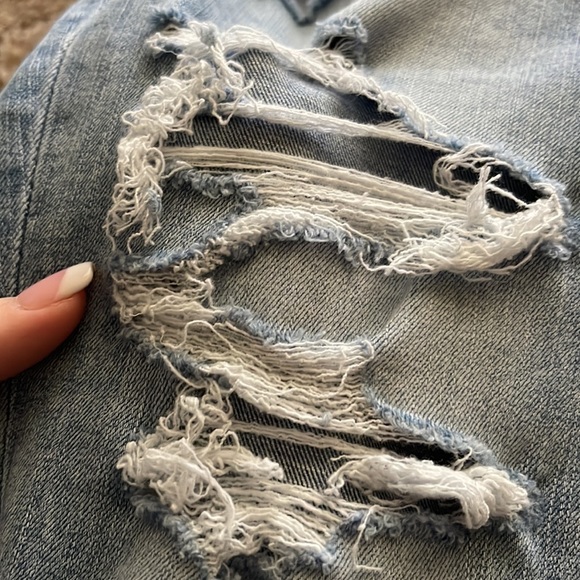 American Eagle Jeggings. Light blue in color with holes down both legs. - Picture 3 of 6